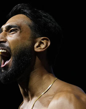 Anshul Jubli of India poses on the scale during the UFC 294 ceremonial weigh-in at Etihad Arena on October 20, 2023 in Abu Dhabi, United Arab Emirates