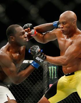 NEW YORK, NY - FEBRUARY 11:  Anderson Silva of Brazil (R) exchanges punches with Derek Brunson (L) of United States in their middleweight bout during UFC 208 at the Barclays Center on February 11, 2017 in the Brooklyn Borough of New York City.  (Photo by 