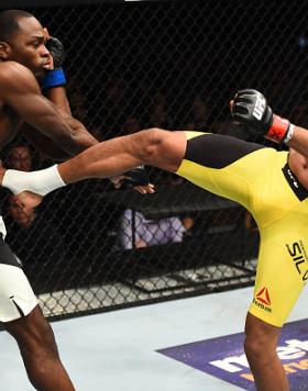BROOKLYN, NEW YORK - FEBRUARY 11:  (R-L) Anderson Silva of Brazil kicks Derek Brunson in their middleweight bout during the UFC 208 event inside Barclays Center on February 11, 2017 in Brooklyn, New York. (Photo by Jeff Bottari/Zuffa LLC/Zuffa LLC via Get
