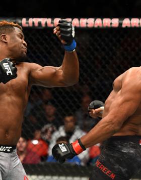 DETROIT, MI - DECEMBER 02:  (L-R) Francis Ngannou of Cameroon punches Alistair Overeem of The Netherlands in their heavyweight bout during the UFC 218 event inside Little Caesars Arena on December 02, 2017 in Detroit, Michigan. (Photo by Josh Hedges/Zuffa