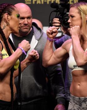 LAS VEGAS, NV - DECEMBER 29:  (L-R) Cris Cyborg of Brazil and Holly Holm face off during the UFC 219 weigh-in inside T-Mobile Arena on December 29, 2017 in Las Vegas, Nevada. (Photo by Jeff Bottari/Zuffa LLC/Zuffa LLC via Getty Images)