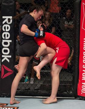 LAS VEGAS, NV - JANUARY 26:  (L-R) Lanchana Green knees Ashley Cummins during the elimination fights at the UFC TUF Gym on January 26, 2016 in Las Vegas, Nevada. (Photo by Brandon Magnus/Zuffa LLC/Zuffa LLC via Getty Images)
