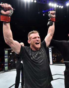 FRESNO, CA - DECEMBER 09:  Scott Holtzman celebrates his victory over Darrell Horcher in their lightweight bout during the UFC Fight Night event inside Save Mart Center on December 9, 2017 in Fresno, California. (Photo by Jeff Bottari/Zuffa LLC/Zuffa LLC 