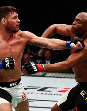LONDON, ENGLAND - FEBRUARY 27:  Anderson 'The Spider' Silva of Brazil (R) and Michael 'The Count' Bisping of England (L) compete in their Middleweight bout during the UFC Fight Night held at at Indigo at The O2 Arena on February 27, 2016 in London, Englan