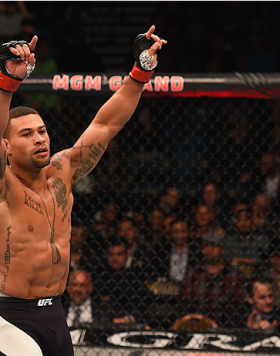 LAS VEGAS, NV - JANUARY 02:  Abel Trujillo reacts to his victory over Tony Sims in their lightweight bout during the UFC 195 event inside MGM Grand Garden Arena on January 2, 2016 in Las Vegas, Nevada.  (Photo by Josh Hedges/Zuffa LLC/Zuffa LLC via Getty 