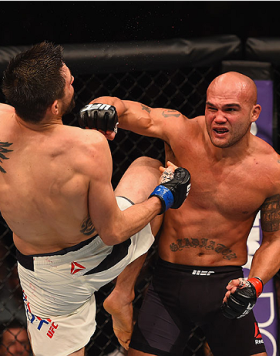 LAS VEGAS, NV - JANUARY 02: (R-L) Robbie Lawler punches Carlos Condit in their UFC welterweight championship bout during the UFC 195 event inside MGM Grand Garden Arena on January 2, 2016 in Las Vegas, Nevada.  (Photo by Josh Hedges/Zuffa LLC/Zuffa LLC vi
