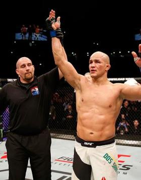 ZAGREB, CROATIA - APRIL 10:   (R-L) Junior Dos Santos celebrates his victory over Ben Rothwell in their heavyweight bout during the UFC Fight Night event at the Arena Zagreb on April 10, 2016 in Zagreb, Croatia. (Photo by Srdjan Stevanovic/Zuffa LLC/Zuffa