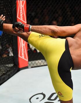 BROOKLYN, NEW YORK - FEBRUARY 11:  (R-L) Anderson Silva of Brazil kicks Derek Brunson in their middleweight bout during the UFC 208 event inside Barclays Center on February 11, 2017 in Brooklyn, New York. (Photo by Jeff Bottari/Zuffa LLC/Zuffa LLC via Get