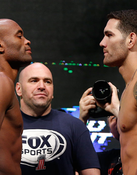 LAS VEGAS, NV - JULY 05:  (L-R) Opponents Anderson Silva and Chris Weidman face off during the UFC 162 weigh-in at the Mandalay Bay Events Center on July 5, 2013 in Las Vegas, Nevada.  (Photo by Josh Hedges/Zuffa LLC/Zuffa LLC via Getty Images)
