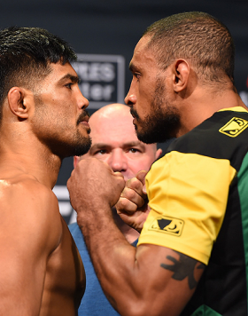 LOS ANGELES, CA - FEBRUARY 27:  (L-R) Opponents Mark Munoz and Roan Carneiro of Brazil face off during the UFC 184 weigh-in at the Event Deck and LA Live on February 27, 2015 in Los Angeles, California. (Photo by Josh Hedges/Zuffa LLC/Zuffa LLC via Getty 
