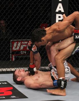 CHICAGO, IL - JANUARY 28:  (R-L) Charles Oliveira punches Eric Wisely during the UFC on FOX event at United Center on January 28, 2012 in Chicago, Illinois.  (Photo by Nick Laham/Zuffa LLC/Zuffa LLC via Getty Images) *** Local Caption *** Eric Wisely; Cha
