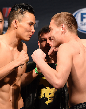 BROOMFIELD, CO - FEBRUARY 13: (L-R) Opponents James Moontasri and Cody Pfister face off during the UFC weigh-in at the 1stBank Center on February 13, 2015 in Broomfield, Colorado. (Photo by Josh Hedges/Zuffa LLC/Zuffa LLC via Getty Images)