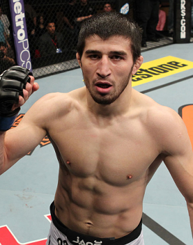 LAS VEGAS, NV - DECEMBER 15:  Rustam Khabilov reacts to his knockout victory over Vinc Pichel after their lightweight fight at the TUF 16 Finale on December 15, 2012  at the Joint at the Hard Rock in Las Vegas, Nevada.  (Photo by Jim Kemper/Zuffa LLC/Zuff