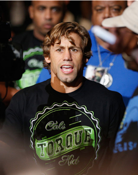LAS VEGAS, NV - JULY 05:  Urijah Faber enters the Octagon before his fight with Alex Caceres in their bantamweight fight at UFC 175 inside the Mandalay Bay Events Center on July 5, 2014 in Las Vegas, Nevada.  (Photo by Josh Hedges/Zuffa LLC/Zuffa LLC via 