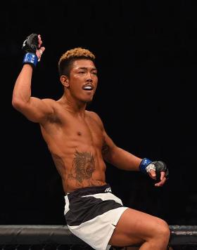 LAS VEGAS, NV - MARCH 05:  Teruto Ishihara of Japan reacts to his victory over Julian Erosa in their featherweight bout during the UFC 196 event inside MGM Grand Garden Arena on March 5, 2016 in Las Vegas, Nevada.  (Photo by Josh Hedges/Zuffa LLC/Zuffa LL