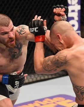 LAS VEGAS, NV - MARCH 05: (L-R) Jim Miller punches Diego Sanchez in their lightweight bout during the UFC 196 event inside MGM Grand Garden Arena on March 5, 2016 in Las Vegas, Nevada.  (Photo by Josh Hedges/Zuffa LLC/Zuffa LLC via Getty Images) *** Local