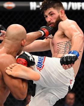 CURITIBA, BRAZIL - MAY 14:  (R-L) Bryan Barberena kicks Warlley Alves of Brazil in their middleweight bout during the UFC 198 event at Arena da Baixada stadium on May 14, 2016 in Curitiba, Parana, Brazil.  (Photo by Josh Hedges/Zuffa LLC/Zuffa LLC via Get