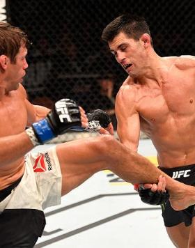 INGLEWOOD, CA - JUNE 04:  Urijah Faber kicks Dominick Cruz in their UFC bantamweight championship bout during the UFC 199 event at The Forum on June 4, 2016 in Inglewood, California.  (Photo by Josh Hedges/Zuffa LLC/Zuffa LLC via Getty Images)