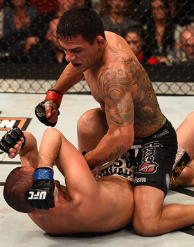 PHOENIX, AZ - DECEMBER 13:  Rafael dos Anjos (top) of Brazil controls the body of Nate Diaz in their lightweight fight during the UFC Fight Night event at the U.S. Airways Center on December 13, 2014 in Phoenix, Arizona.  (Photo by Josh Hedges/Zuffa LLC/Z