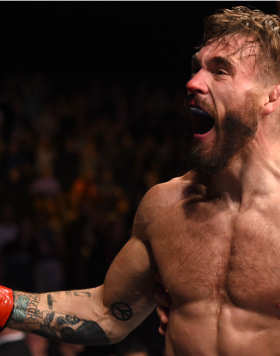 GLASGOW, SCOTLAND - JULY 18:  Robert Whiteford of Scotland reacts after his TKO victory over Paul Redmond of Ireland in their featherweight fight during the UFC Fight Night event inside the SSE Hydro on July 18, 2015 in Glasgow, Scotland.  (Photo by Josh 