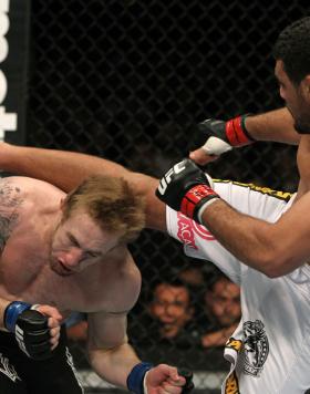NASHVILLE, TN - JANUARY 20:  (R-L) Fabricio Camoes kicks Tommy Hayden during the UFC on FX event at Bridgestone Arena on January 20, 2012 in Nashville, Tennessee.  (Photo by Josh Hedges/Zuffa LLC/Zuffa LLC via Getty Images)