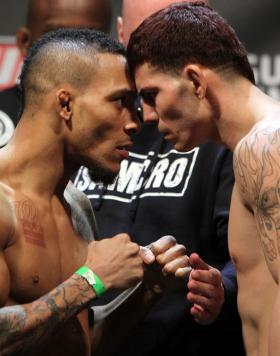 NASHVILLE, TN - JANUARY 19:  (L-R) Bantamweight opponents Mike Easton and Jared Papazian face off after weighing in during the UFC on FX official weigh in at Bridgestone Arena on January 19, 2012 in Nashville, Tennessee.  (Photo by Josh Hedges/Zuffa LLC/Z