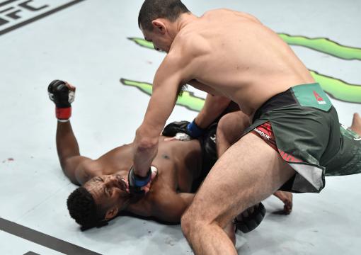 Alessio di Chirico of Italy punches Joaquin Buckley in a middleweight bout during the UFC Fight Night event at Etihad Arena on UFC Fight Island on January 17, 2021 in Abu Dhabi, United Arab Emirates. (Photo by Jeff Bottari/Zuffa LLC)