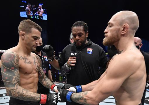 Opponents Dustin Poirier and Conor McGregor of Ireland face off prior to their lightweight fight during the UFC 257 event inside Etihad Arena on UFC Fight Island on January 23, 2021 in Abu Dhabi, United Arab Emirates. (Photo by Jeff Bottari/Zuffa LLC)