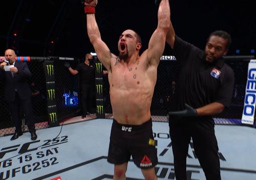Robert Whittaker celebrates after defeating Darren Till on UFC Fight Island 2020