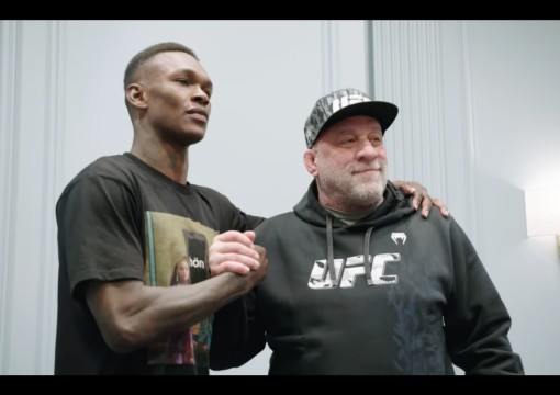 Israel Adesanya poses for photo during UFC 271: Adesanya vs Whittaker 2 fight week