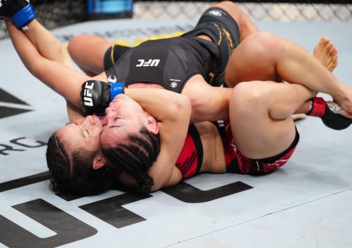 Zhang Weili of China secures a rear choke submission against Carla Esparza in the UFC strawweight championship bout during the UFC 281 event at Madison Square Garden on November 12, 2022 in New York City. (Photo by Jeff Bottari/Zuffa LLC)
