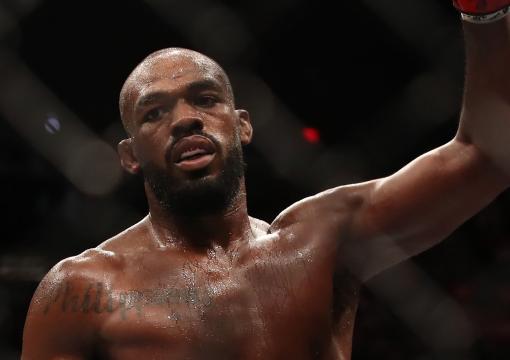 Jon Jones raises his hand at the end of his fight against Thiago Santos of Brazil in their UFC light heavyweight championship fight during the UFC 239 event at T-Mobile Arena on July 6, 2019 in Las Vegas, Nevada. (Photo by Christian Petersen/Zuffa LLC/Zuffa LLC)