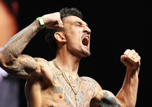 Max Holloway poses on the scale during the UFC 276 ceremonial weigh-in at T-Mobile Arena on July 01, 2022 in Las Vegas, Nevada. (Photo by Chris Unger/Zuffa LLC)