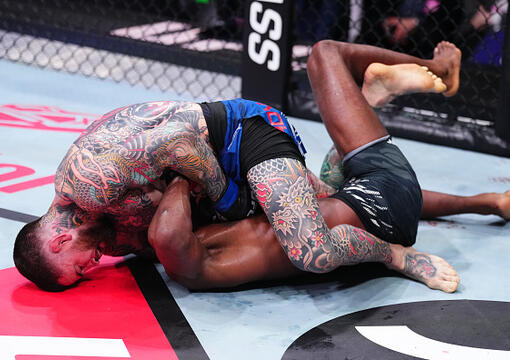 Sean Brady secures a guillotine choke submission against Leon Edwards of Jamaica in a welterweight fight during the UFC Fight Night event at The O2 on March 22, 2025 in London, England. (Photo by Jeff Bottari/Zuffa LLC)