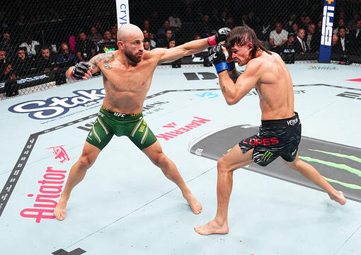 Alexander Volkanovski of Australia punches Diego Lopes of Brazil in the UFC featherweight championship bout during the UFC 314 event at Kaseya Center on April 12, 2025 in Miami, Florida. (Photo by Jeff Bottari/Zuffa LLC)