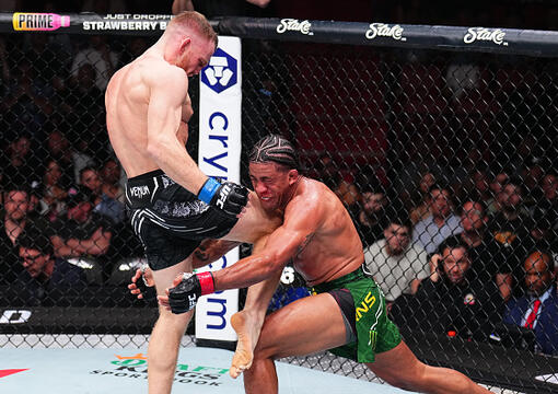 Jack Della Maddalena of Australia knees Gilbert Burns of Brazil in a welterweight fight during the UFC 299 event at Kaseya Center on March 09, 2024 in Miami, Florida. (Photo by Chris Unger/Zuffa LLC)