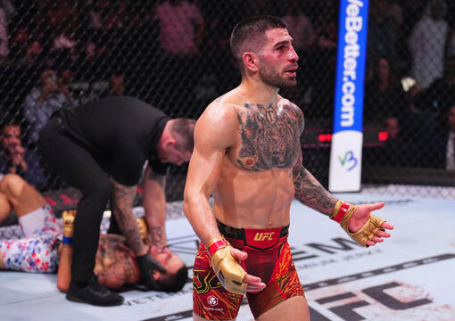 Ilia Topuria of Spain reacts after a knockout victory against Max Holloway in the UFC featherweight championship fight during the UFC 308 event at Etihad Arena on October 26, 2024 in Abu Dhabi, United Arab Emirates. (Photo by Chris Unger/Zuffa LLC)