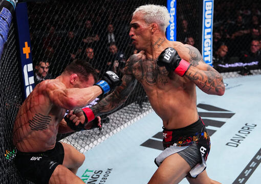 Charles Oliveira of Brazil punches Michael Chandler of the United States of America in a lightweight fight during the UFC 309 event at Madison Square Garden on November 16, 2024 in New York City. (Photo by Jeff Bottari/Zuffa LLC)
