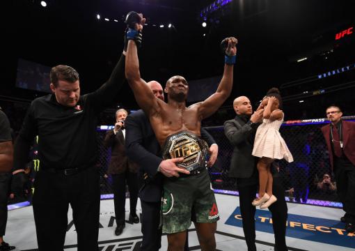 Black History: Kamaru Usman, born in Nigeria, defeats Tyron Woodley to become the UFC welterweight champion at UFC 235