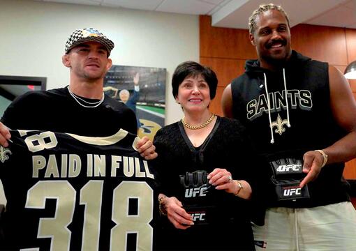 Dustin Poirier meets with the New Orleans Saints and gets a custom jersey ahead of UFC 318