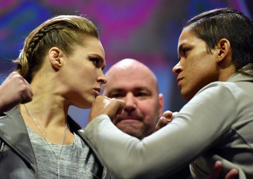 NEW YORK, NY - NOVEMBER 11:  UFC 207 opponents Ronda Rousey (L) and Amanda Nunes (R) face off after the UFC 205 weigh-in inside Madison Square Garden on November 11, 2016 in New York City. (Photo by Brandon Magnus/Zuffa LLC/Zuffa LLC via Getty Images)