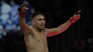 LOS ANGELES, CA - AUGUST 04: Alex Perez celebrates after his TKO victory over Jose Torres in their flyweight fight during the UFC 227 event inside Staples Center on August 4, 2018 in Los Angeles, California. (Photo by Jeff Bottari/Zuffa LLC/Zuffa LLC via Getty Images)
