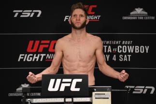 OTTAWA, ON - MAY 03: Cole Smith poses on the scale during the UFC Fight Night weigh-in at Andaz Ottawa Byward Market on March 03, 2019 in Ottawa, Ontario, Canada. (Photo by Jeff Bottari/Zuffa LLC/Zuffa LLC via Getty Images)