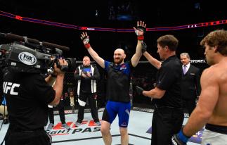 KANSAS CITY, MO - APRIL 15: Zak Cummings celebrates his submission victory over Nathan Coy in their welterweight fight during the UFC Fight Night event at Sprint Center on April 15, 2017 in Kansas City, Missouri. (Photo by Josh Hedges/Zuffa LLC/Zuffa LLC via Getty Images)