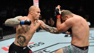 HAMBURG, GERMANY - JULY 22: (L-R) Anthony Smith punches Mauricio Rua of Brazil in their light heavyweight bout during the UFC Fight Night at Barclaycard Arena on July 22, 2018 in Hamburg, Germany. (Photo by Jeff Bottari/Zuffa LLC/Zuffa LLC via Getty Images)