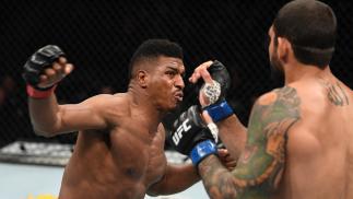 Alonzo Menifield punches Vinicius Moreira of Brazil in their light heavyweight bout during the UFC Fight Night event at the Barclays Center on January 19, 2019 in the Brooklyn borough of New York City. (Photo by Josh Hedges/Zuffa LLC)