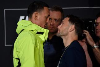 EDMONTON, AB - JULY 25: (L-R) Opponents Max Holloway and Frankie Edgar face off for media during the UFC 240 Ultimate Media Day at Delta Hotels by Marriott Edmonton South Conference Centre on July 25, 2019 in Edmonton, Alberta, Canada. (Photo by Jeff Bottari/Zuffa LLC/Zuffa LLC via Getty Images)