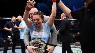 Nicco Montano celebrates her unanimous-decision victory over Roxanne Modafferi in their women's flyweight championship bout during the TUF Finale event inside Park Theater on December 01, 2017 in Las Vegas, Nevada. (Photo by Jeff Bottari/Zuffa LLC)