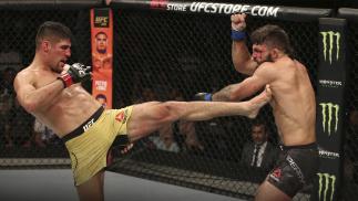 MONTEVIDEO, URUGUAY - AUGUST 10: (L-R) Vicente Luque kicks Mike Perry in their welterweight fight during the UFC Fight Night event at Antel Arena on August 10, 2019 in Montevideo, Uruguay. (Photo by Alexandre Schneider /Zuffa LLC/Zuffa LLC)