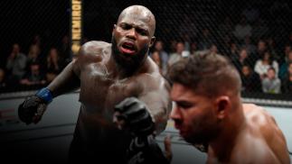 Jairzinho Rozenstruik of Suriname punches Alistair Overeem of Netherlands in their heavyweight bout during the UFC Fight Night event at Capital One Arena on December 07, 2019 in Washington, DC. (Photo by Jeff Bottari/Zuffa LLC)